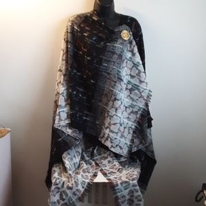 Womens wrap with fashion broach.